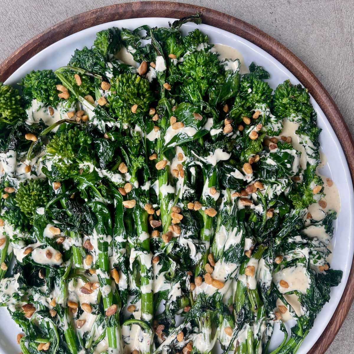 Grilled Broccoli Rabe and Amba Aioli with Cataluña Walnuts